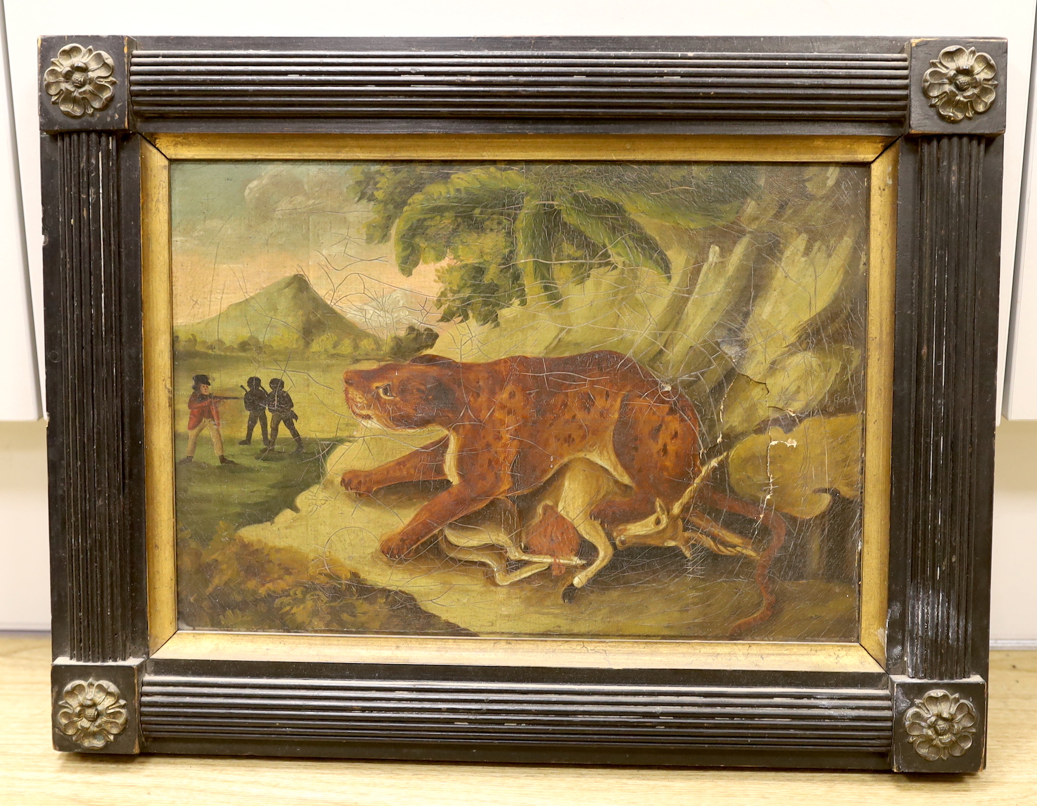 19th century English naive School, oil on canvas, Lion Hunt, 23 x 33cm, housed in an ebonised frame with applied Tudor Rose mounts